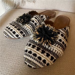 Anthropologie Slipper Shoes with Textured Fabric and leather detail. size 9
